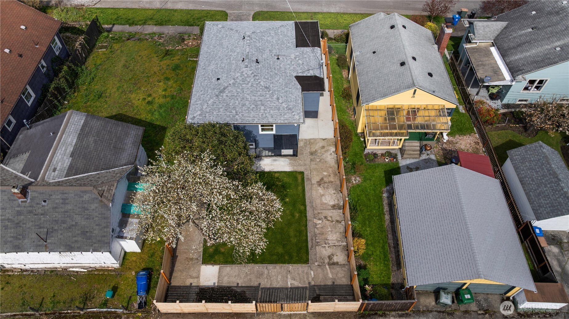 1811 South Stevens Street Seattle, WA 98144 - Photo 36 of 38 an aerial view of a house with a yard garden and outdoor seating