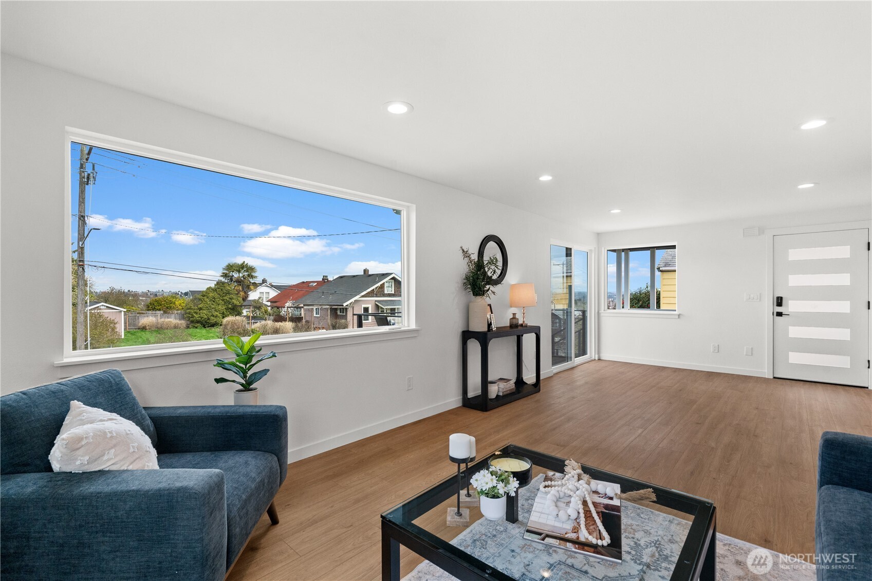 1811 South Stevens Street Seattle, WA 98144 - Photo 9 of 38 a living room with furniture and a flat screen tv