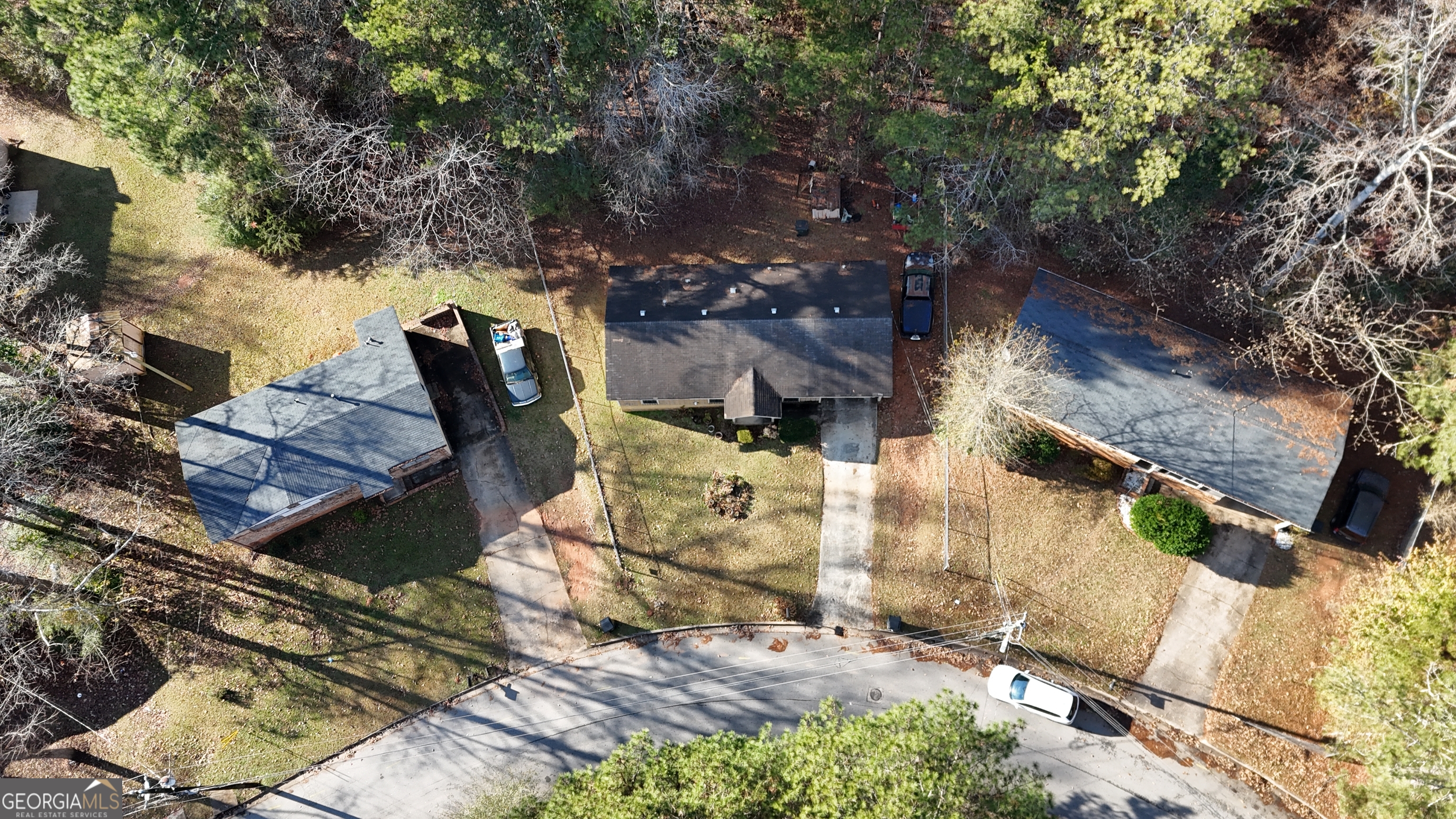 7118 Pineneedle Drive Southwest Covington, GA 30014 - Photo 17 of 17 an aerial view of a house with a yard
