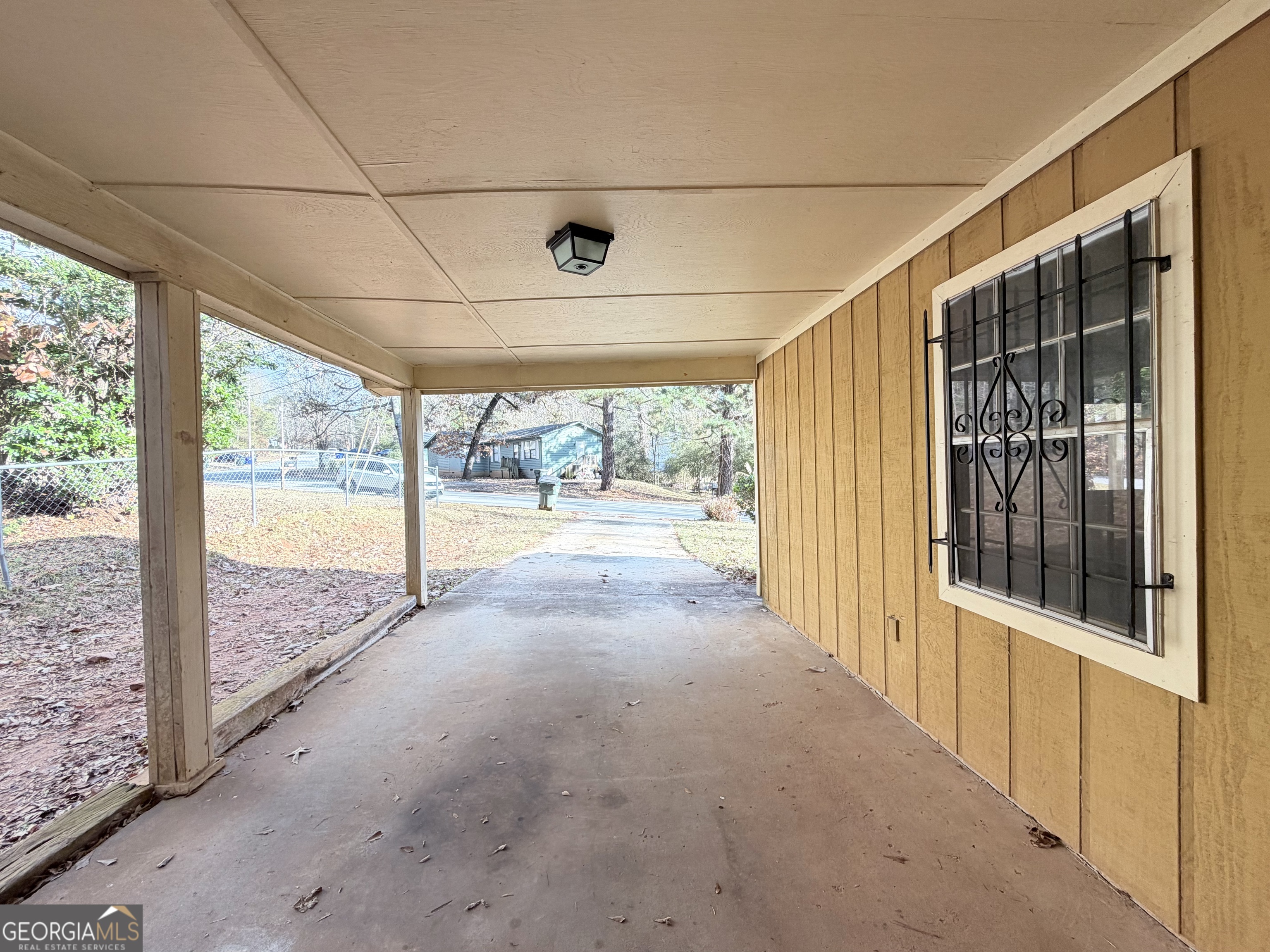7118 Pineneedle Drive Southwest Covington, GA 30014 - Photo 2 of 17 a view of a glass door and the balcony