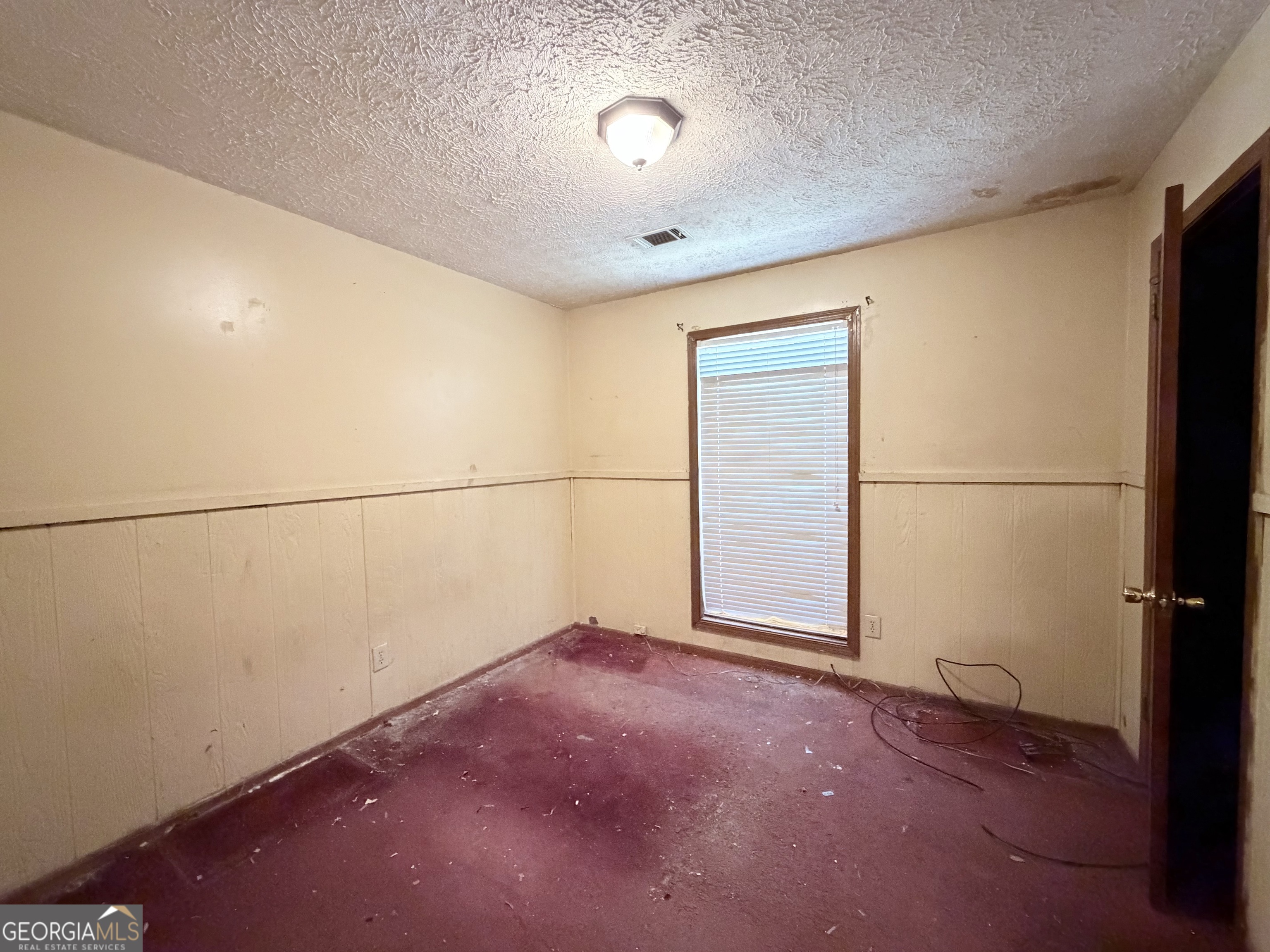 7118 Pineneedle Drive Southwest Covington, GA 30014 - Photo 9 of 17 a view of a room with an empty space