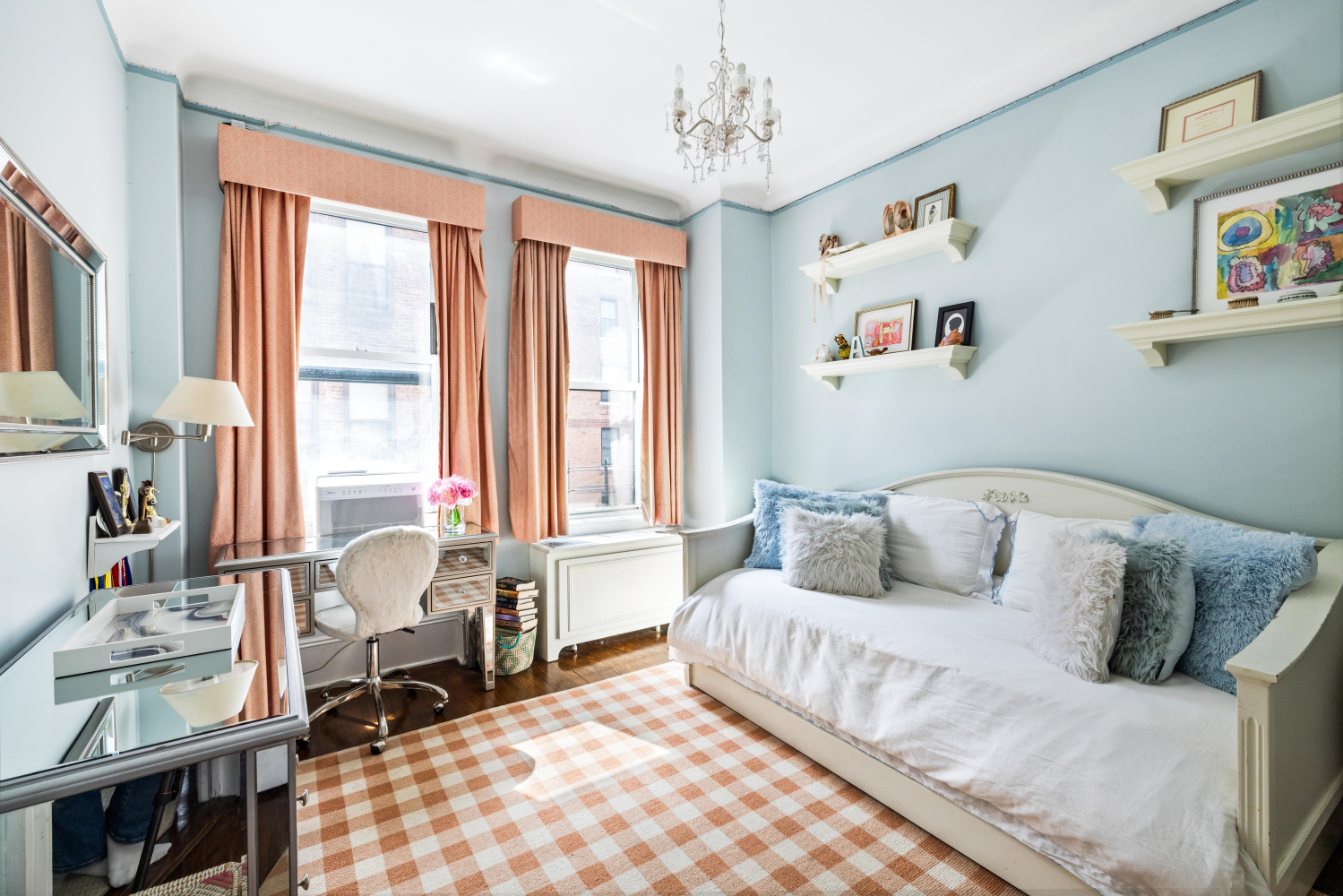 114 East 84th Street, Unit 8B Manhattan, NY 10028 - Photo 10 of 15 a living room with furniture and a large window