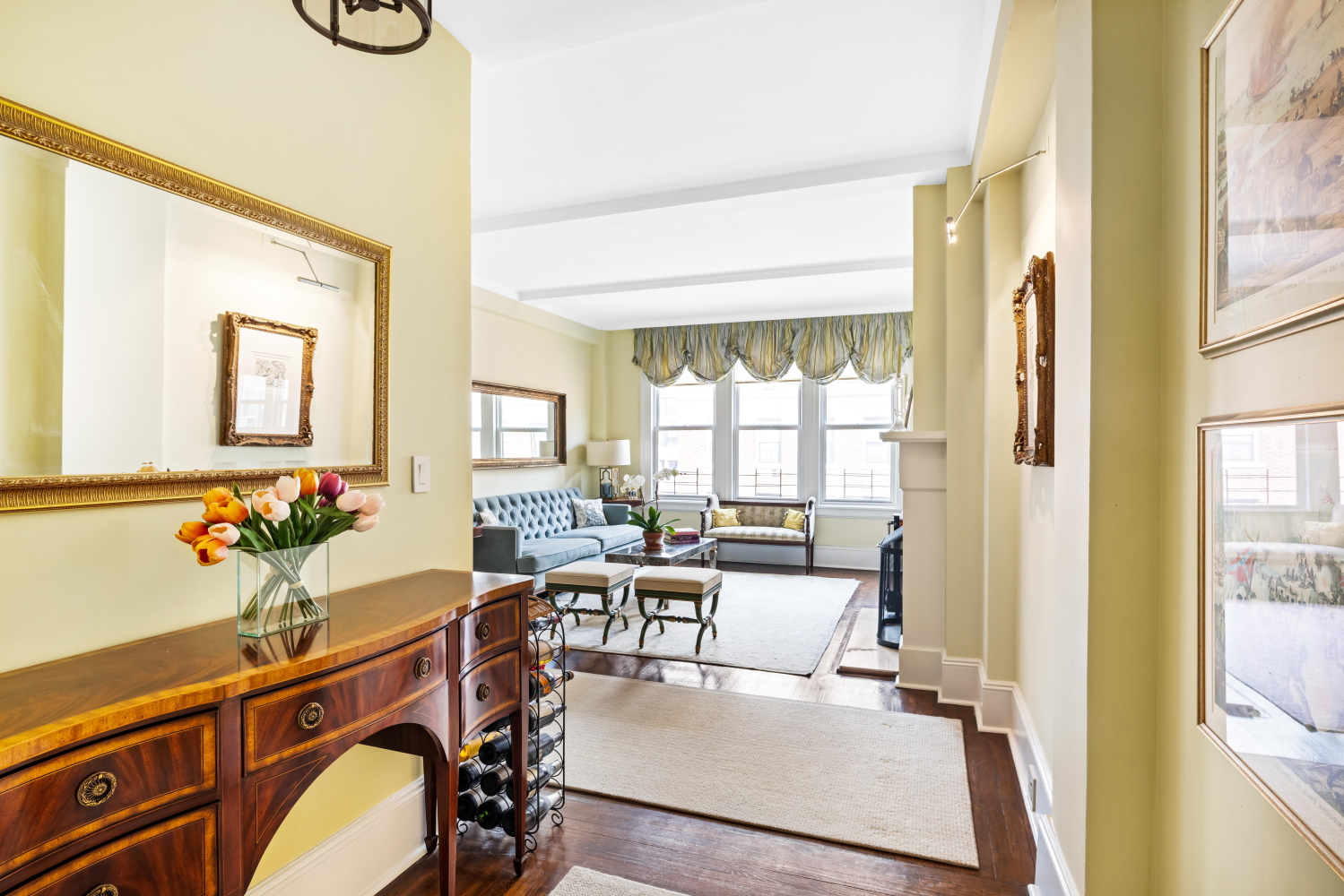 114 East 84th Street, Unit 8B Manhattan, NY 10028 - Photo 2 of 15 a view of a dining room with furniture window and wooden floor