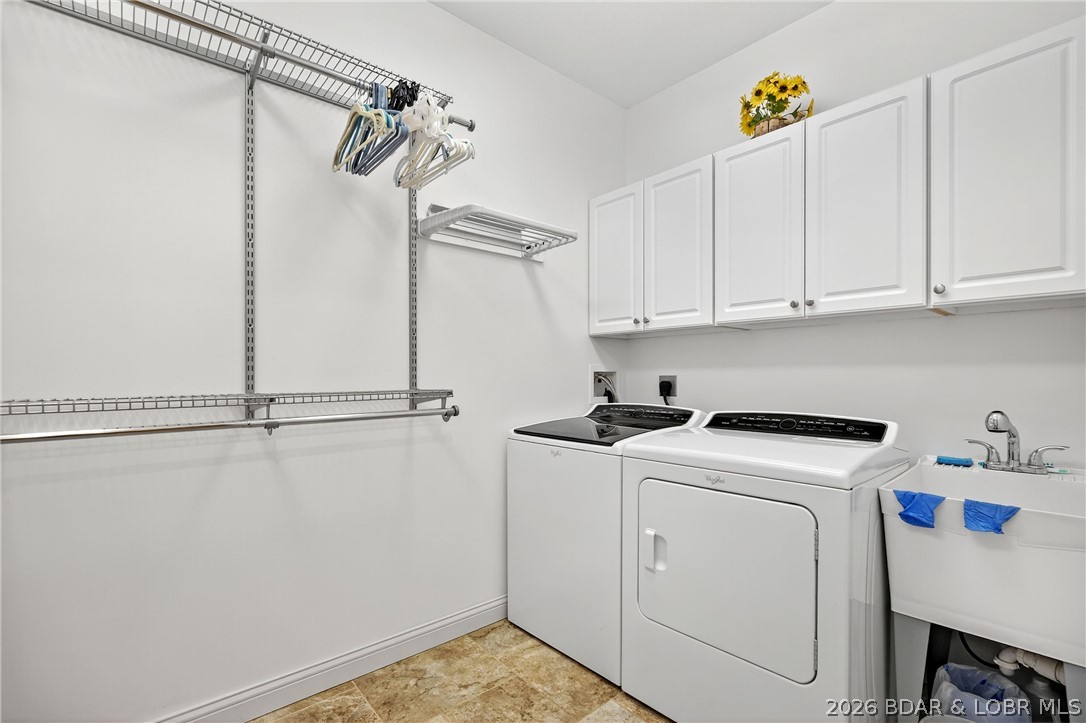 331 Hollow Oak Road Sunrise Beach, MO 65079 - Photo 32 of 66 Primary walk-in closet/laundry