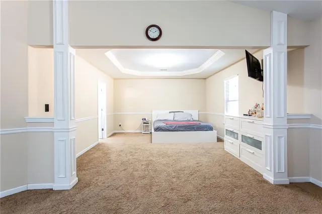 a room with a sink and a mirror