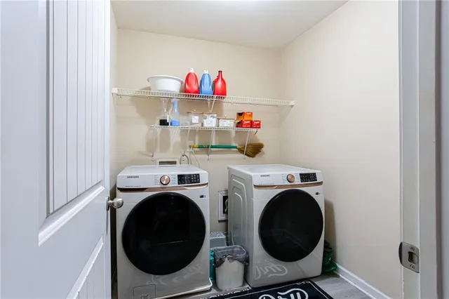 a utility room with dryer and washer