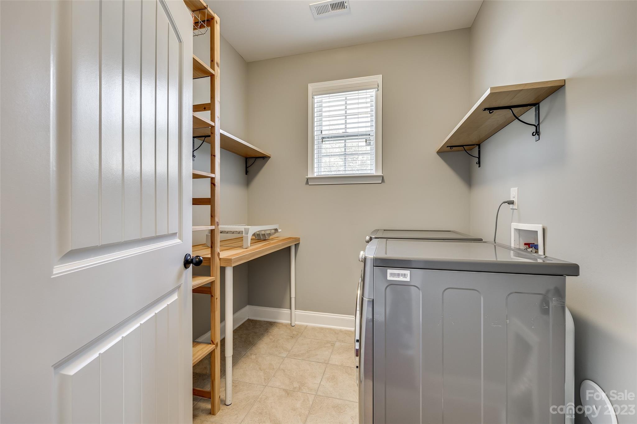 198 Annatto Way Tega Cay, SC 29708 - Photo 21 of 45 a view of kitchen and utility room