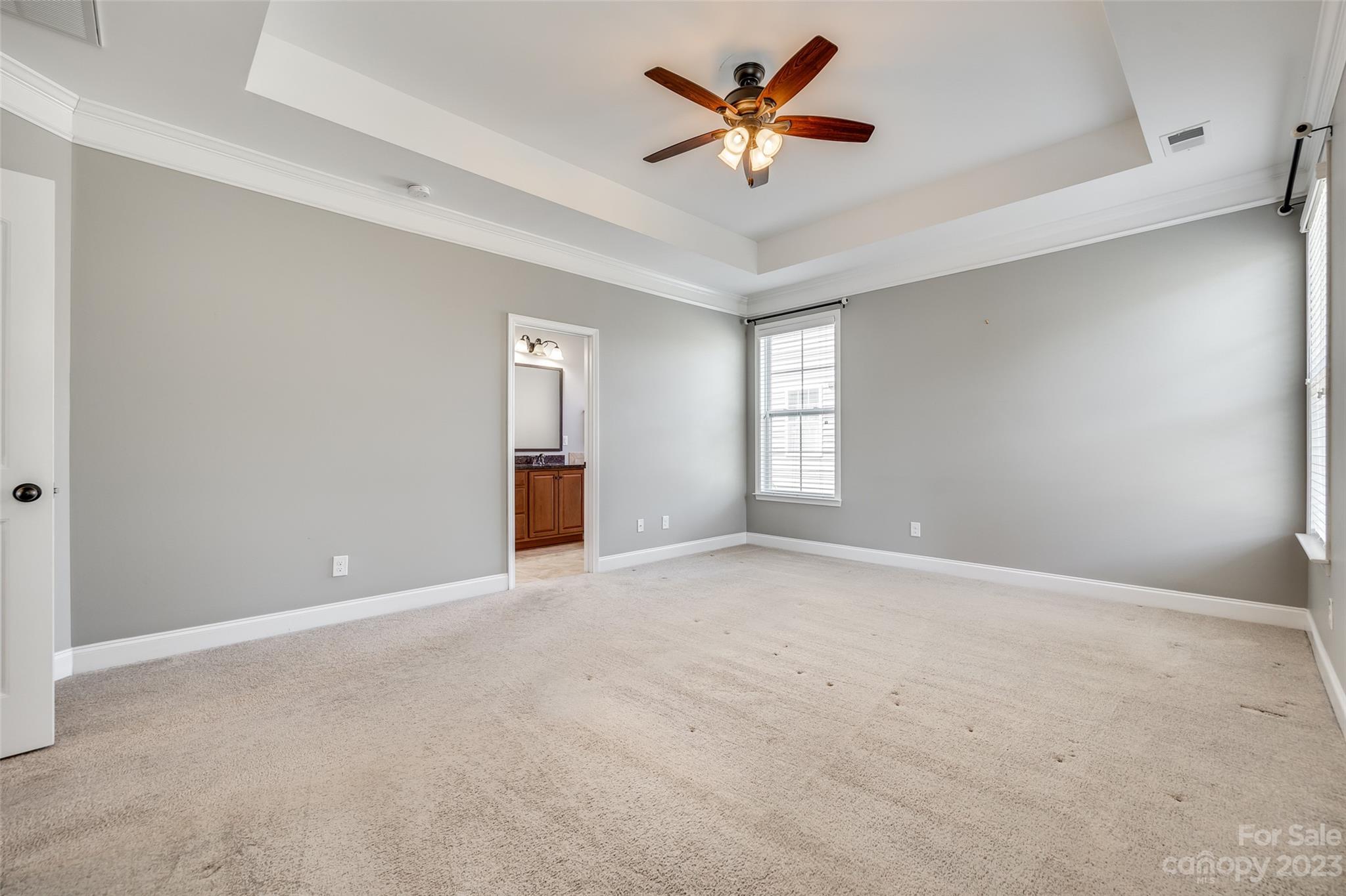 198 Annatto Way Tega Cay, SC 29708 - Photo 23 of 45 a view of an empty room with a window