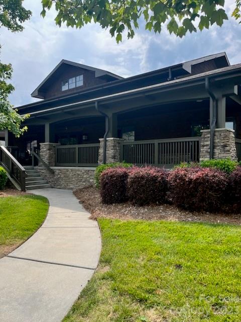 198 Annatto Way Tega Cay, SC 29708 - Photo 43 of 45 a house view with a garden space