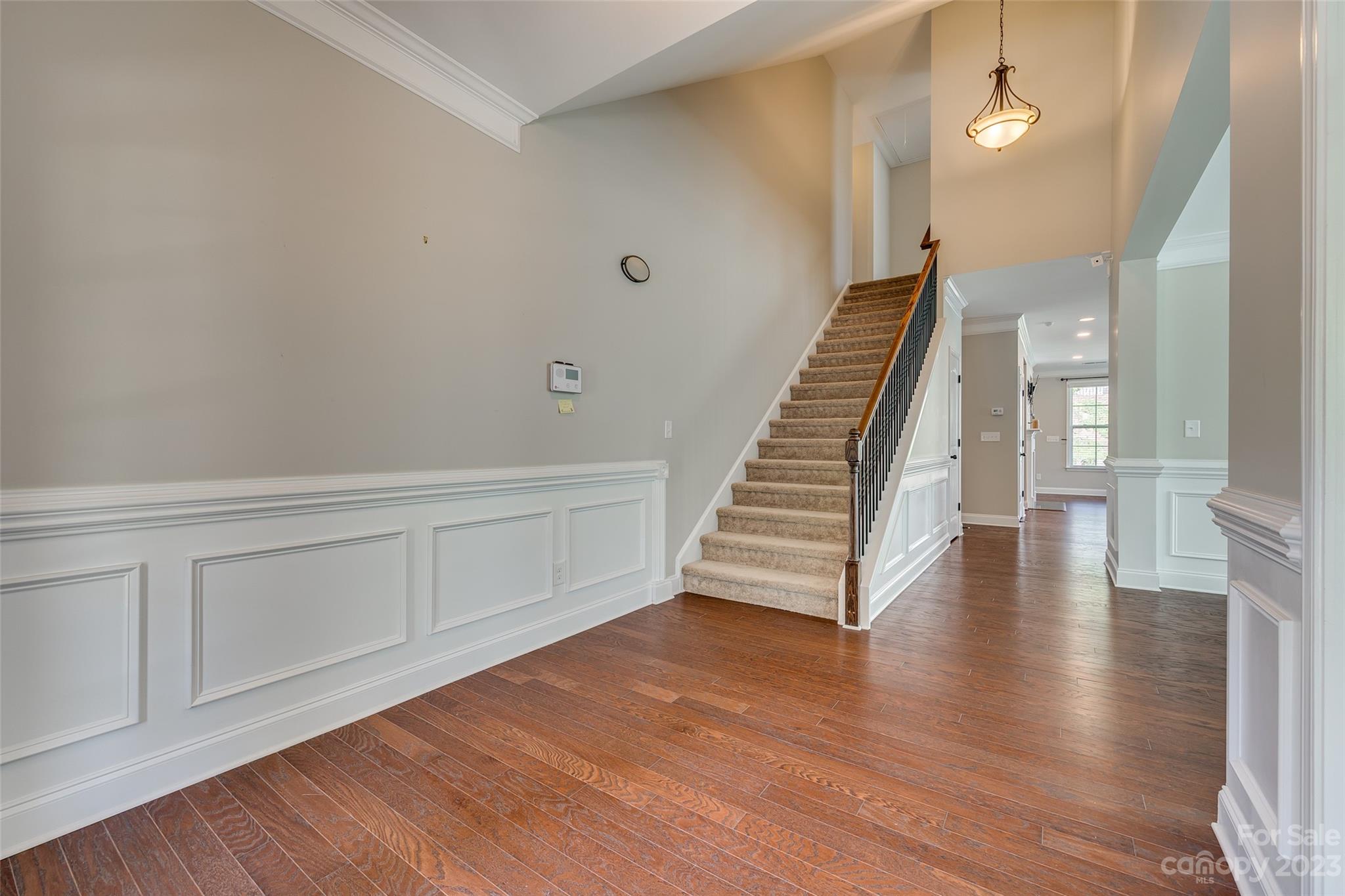 198 Annatto Way Tega Cay, SC 29708 - Photo 5 of 45 a view of an entryway with wooden floor