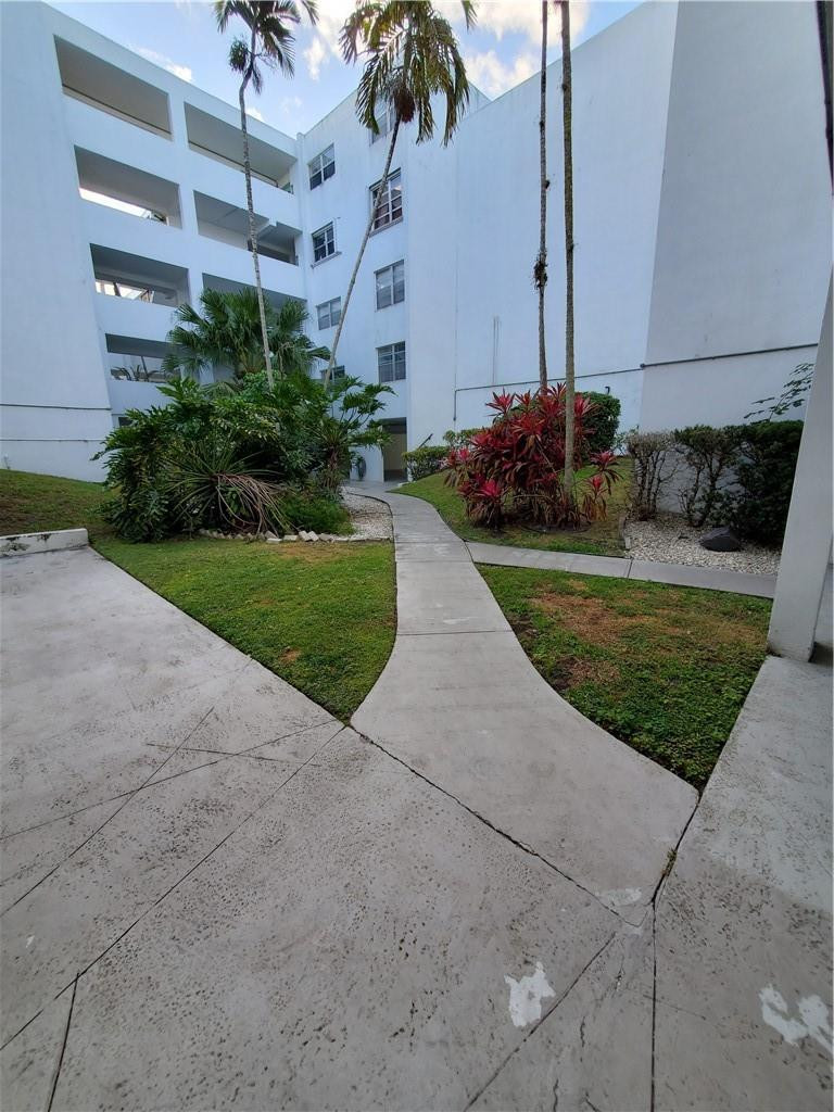 6903 Cypress Road, Unit B25 Plantation, FL 33317 - Photo 30 of 38 WALK AREA TO UNIT