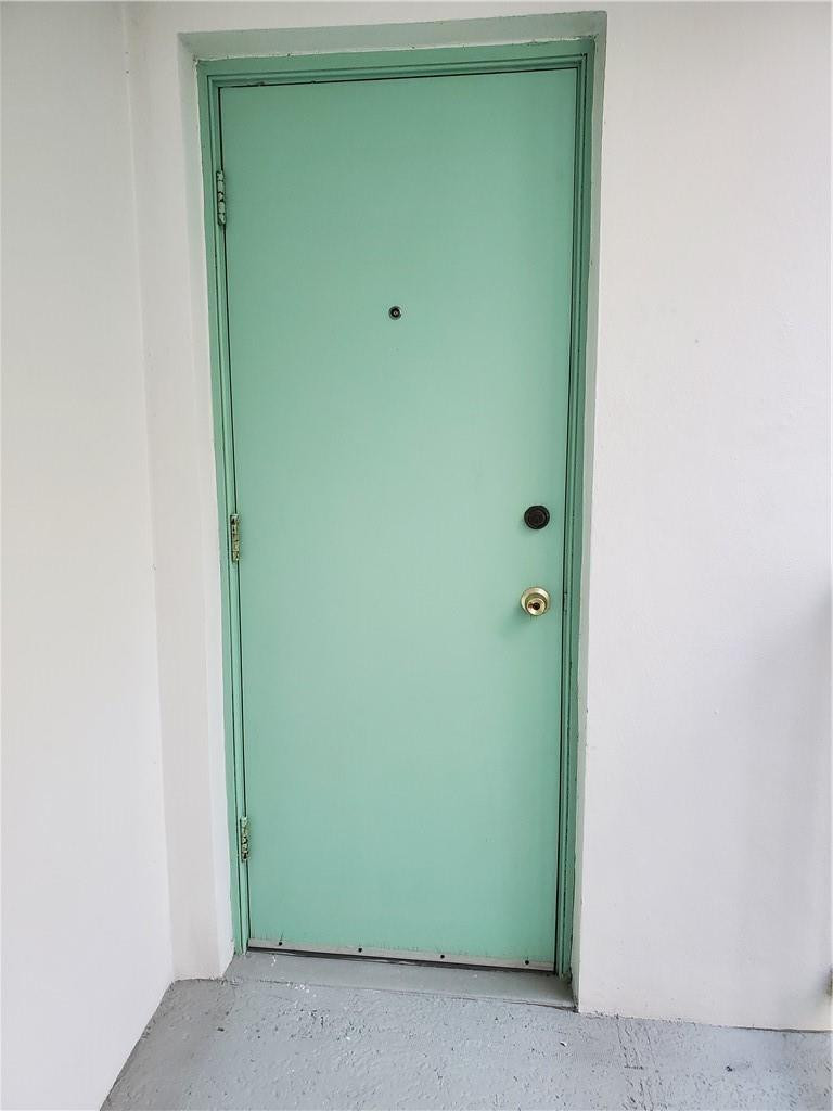 6903 Cypress Road, Unit B25 Plantation, FL 33317 - Photo 37 of 38 KITCHEN DOOR