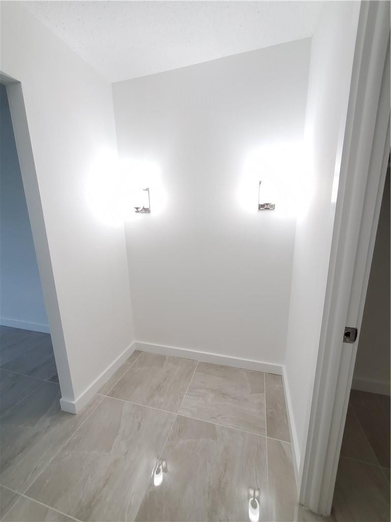 6903 Cypress Road, Unit B25 Plantation, FL 33317 - Photo 7 of 38 VANITY AREA IN MASTER BEDROOM