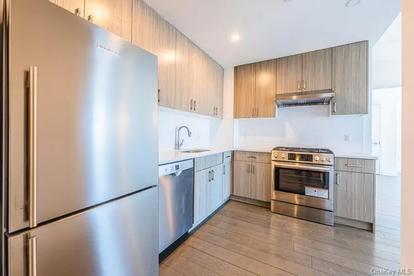 a view of kitchen with washer and dryer