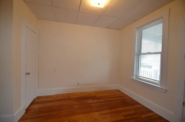 a bathroom with a shower and a sink