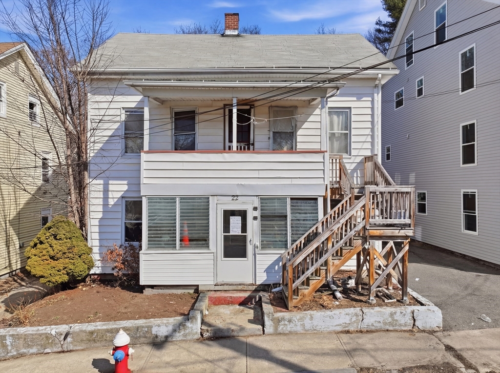 22 Vigeant Street Ware, MA 01082 - Photo 1 of 16 a front view of a house with garage