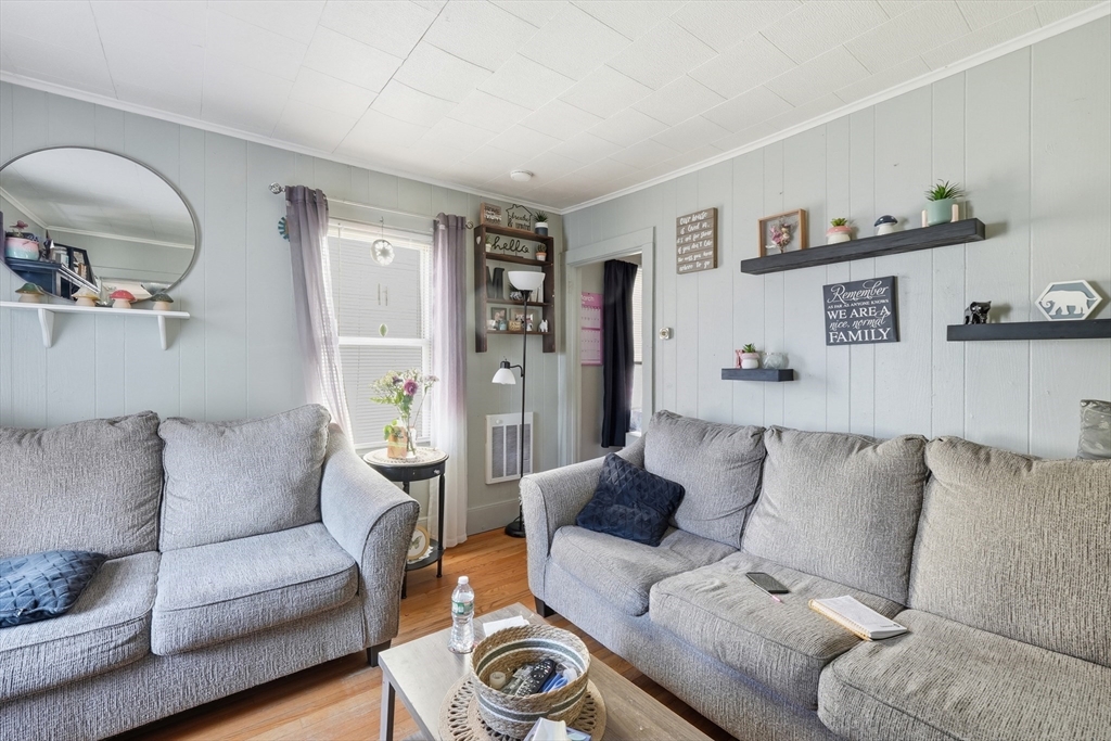 22 Vigeant Street Ware, MA 01082 - Photo 4 of 16 a living room with furniture and a couch