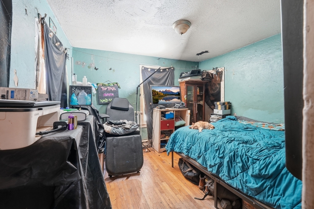 22 Vigeant Street Ware, MA 01082 - Photo 10 of 16 a living room with furniture and a gym equipment