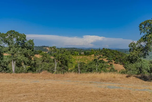 a view of a lake with mountain in the background