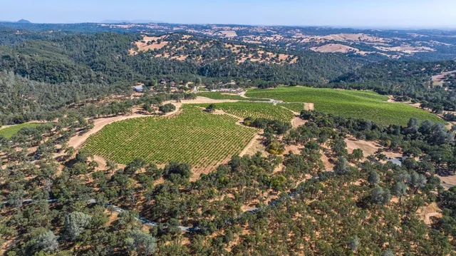 a view of a city with mountains in the background