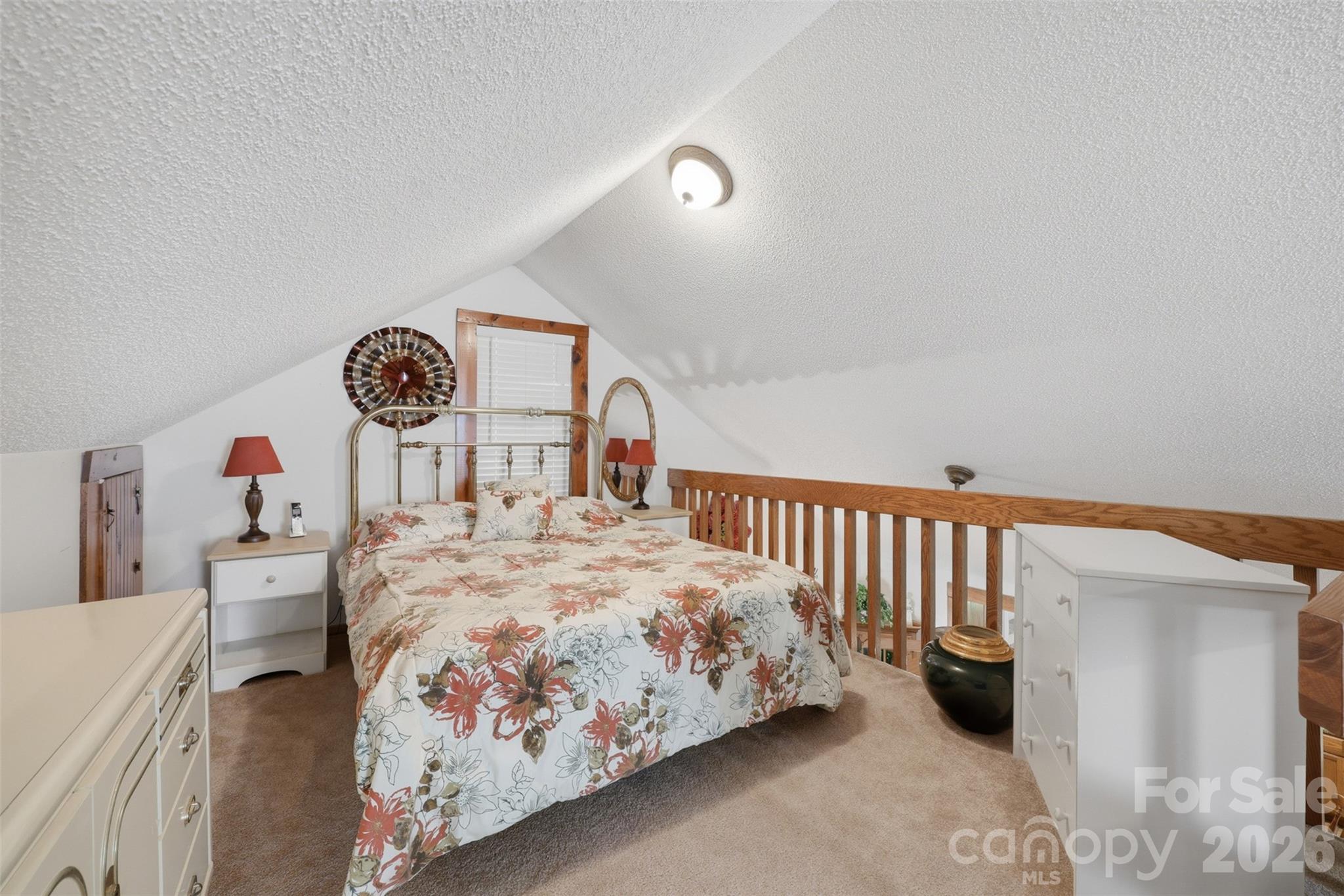 176-174 Oak Hollow Road Union Grove, NC 28689 - Photo 30 of 48 a bedroom with a bed and a table