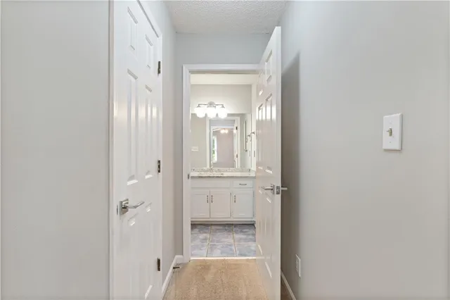 view of a bathroom from a hallway
