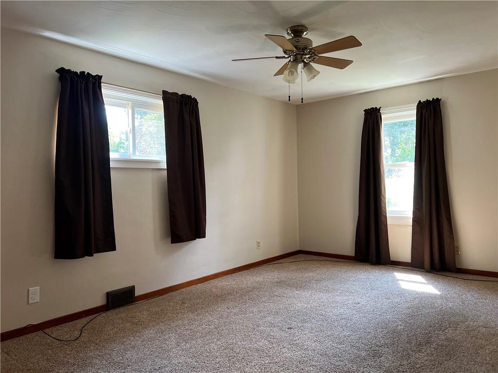 128 Reed Street Lower Burrell, PA 15068 - Photo 16 of 31 Spacious master bedroom on main level.