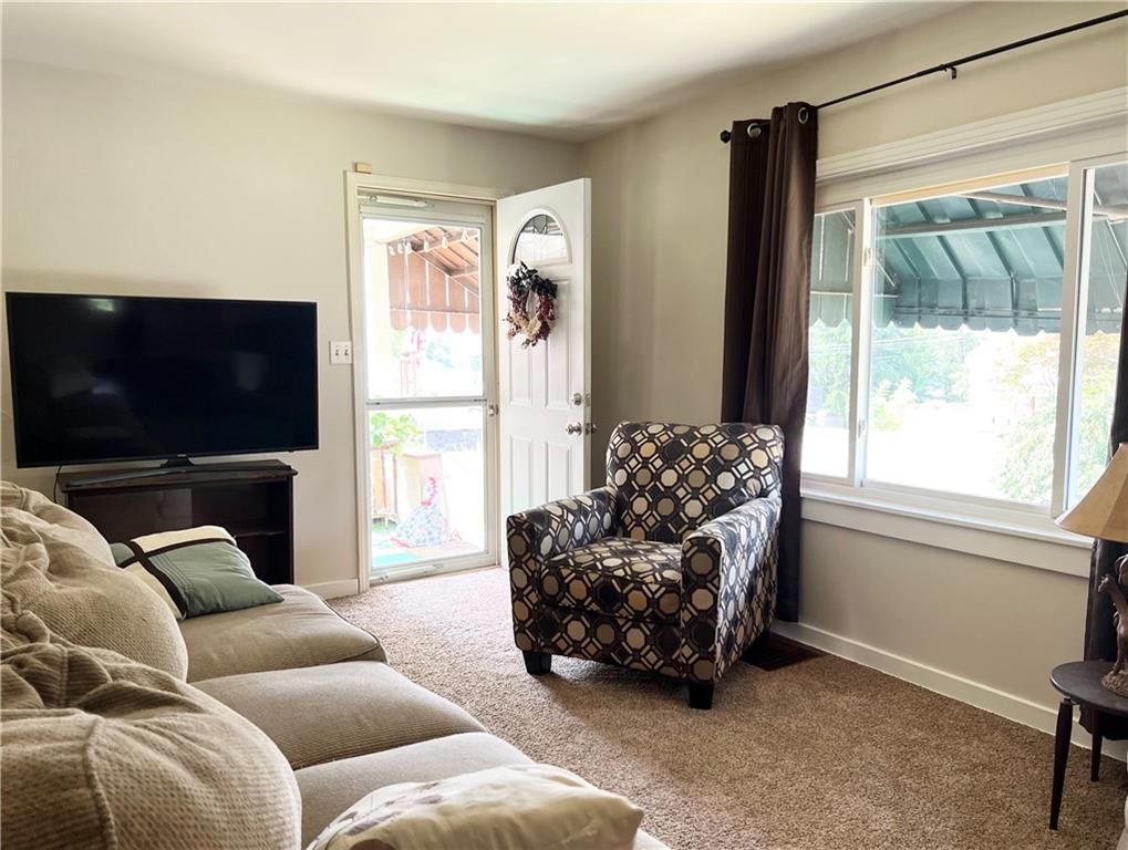 128 Reed Street Lower Burrell, PA 15068 - Photo 10 of 31 Ample natural light with newer carpet.
