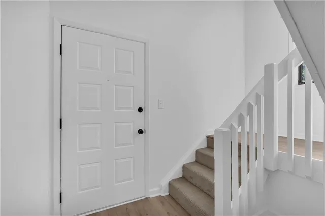 a view of entryway with stairs