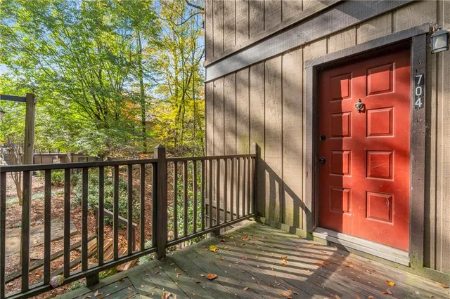 a porch with a table in front of it