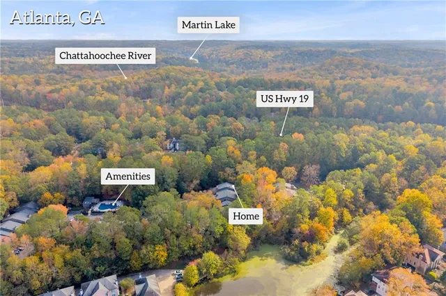 a sign that is on a wall next to a road