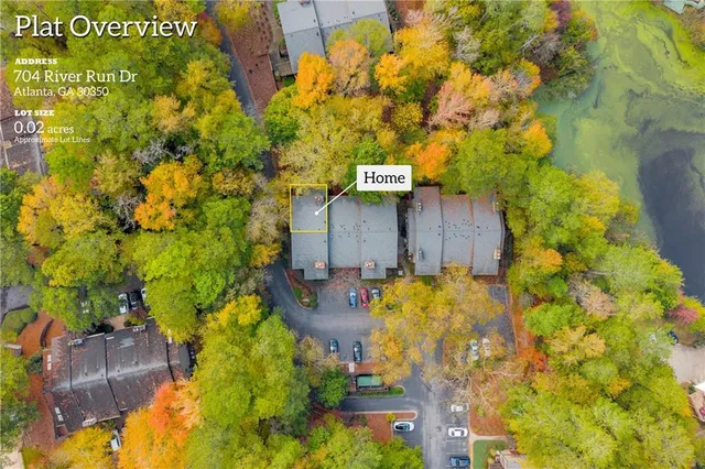 a picture of a wall with a white wall and a white refrigerator