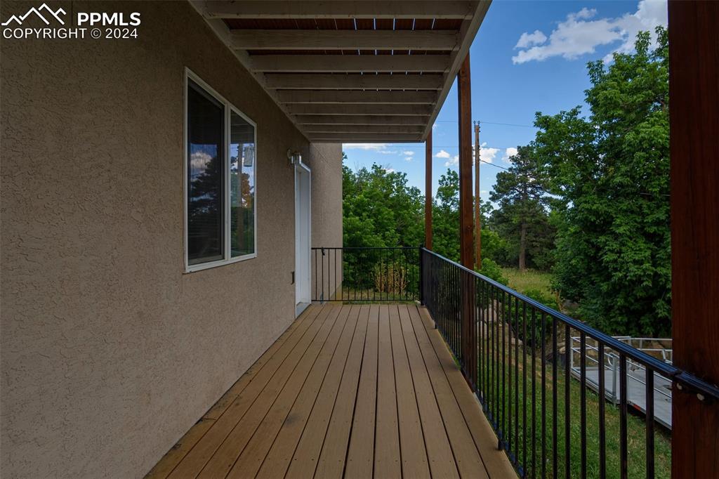 6010 Oak Street Rye, CO 81069 - Photo 11 of 29 a view of balcony with wooden floor and fence