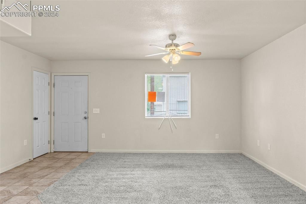 6010 Oak Street Rye, CO 81069 - Photo 14 of 29 an empty room with windows and fan