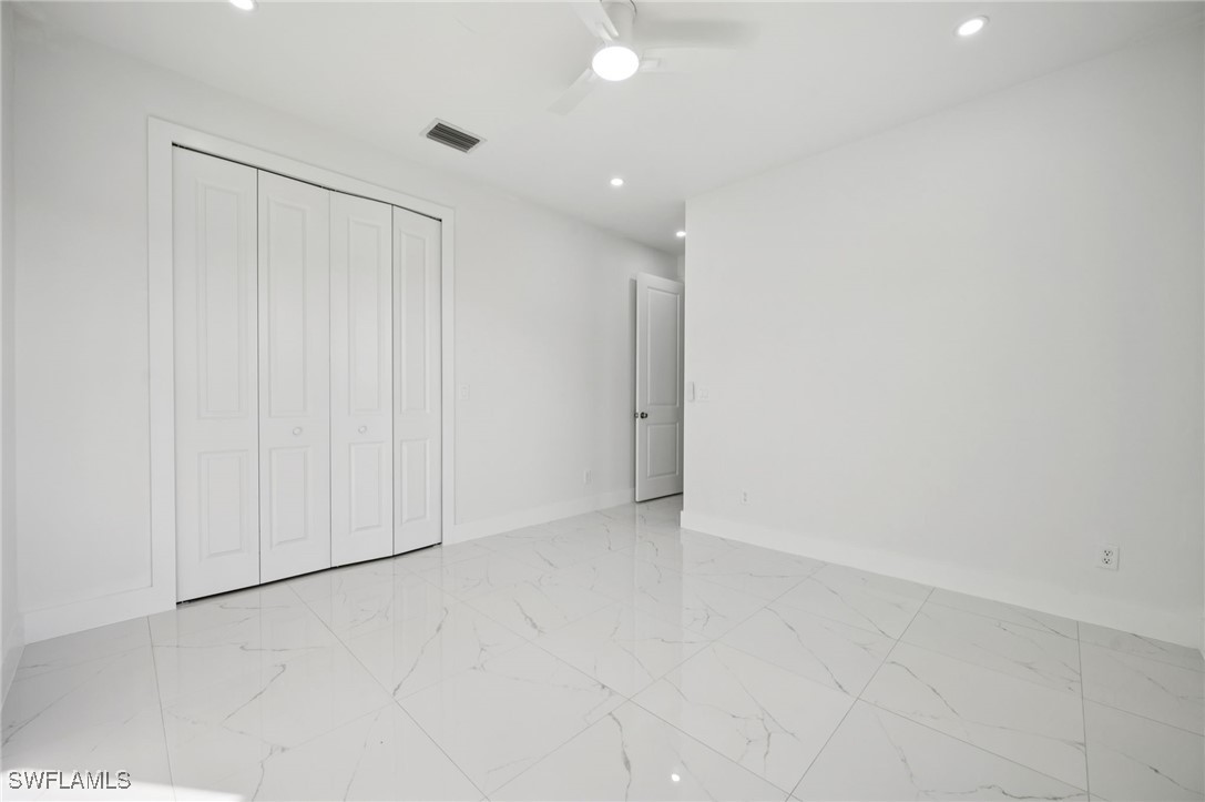 4701-4703 28th Street Southwest Lehigh Acres, FL 33973 - Photo 14 of 37 a view of an empty room