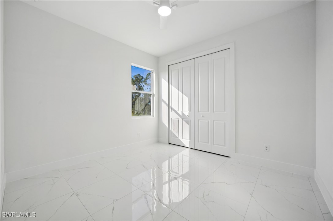 4701-4703 28th Street Southwest Lehigh Acres, FL 33973 - Photo 16 of 37 a view of entryway with wooden floor