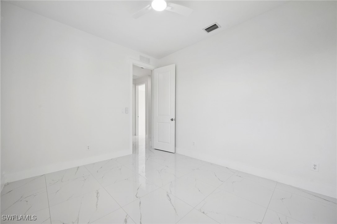 4701-4703 28th Street Southwest Lehigh Acres, FL 33973 - Photo 20 of 37 a view of an empty room
