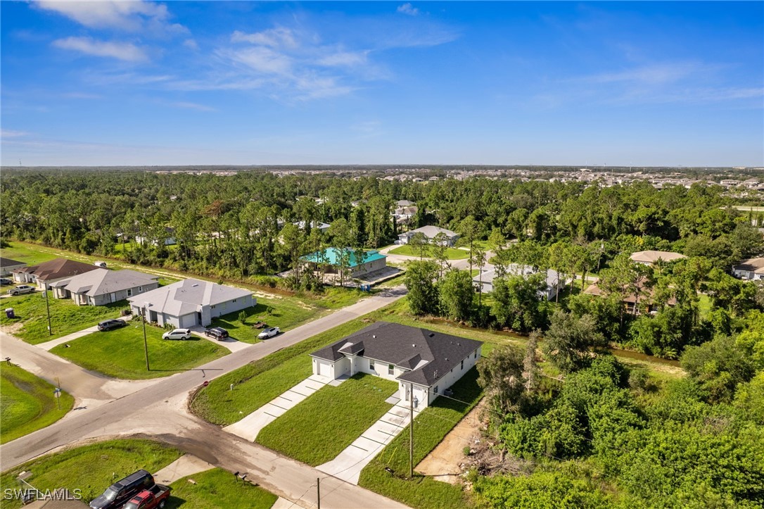 4701-4703 28th Street Southwest Lehigh Acres, FL 33973 - Photo 25 of 37 a view of a city