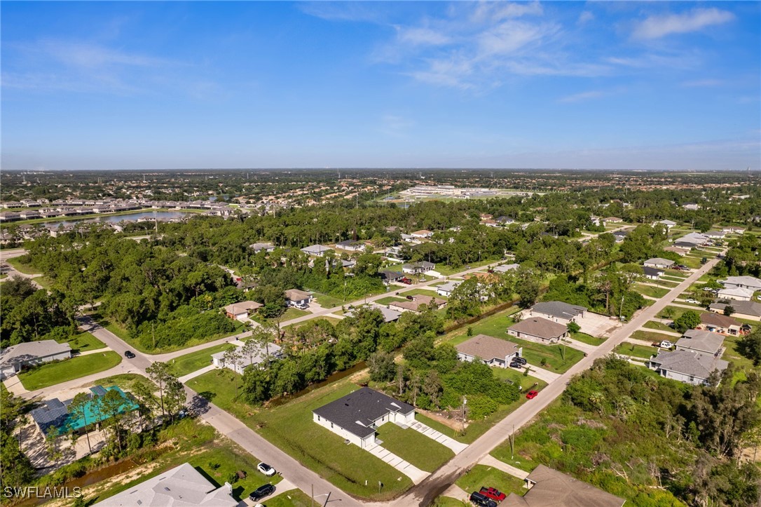 4701-4703 28th Street Southwest Lehigh Acres, FL 33973 - Photo 37 of 37 an aerial view of residential houses with city view