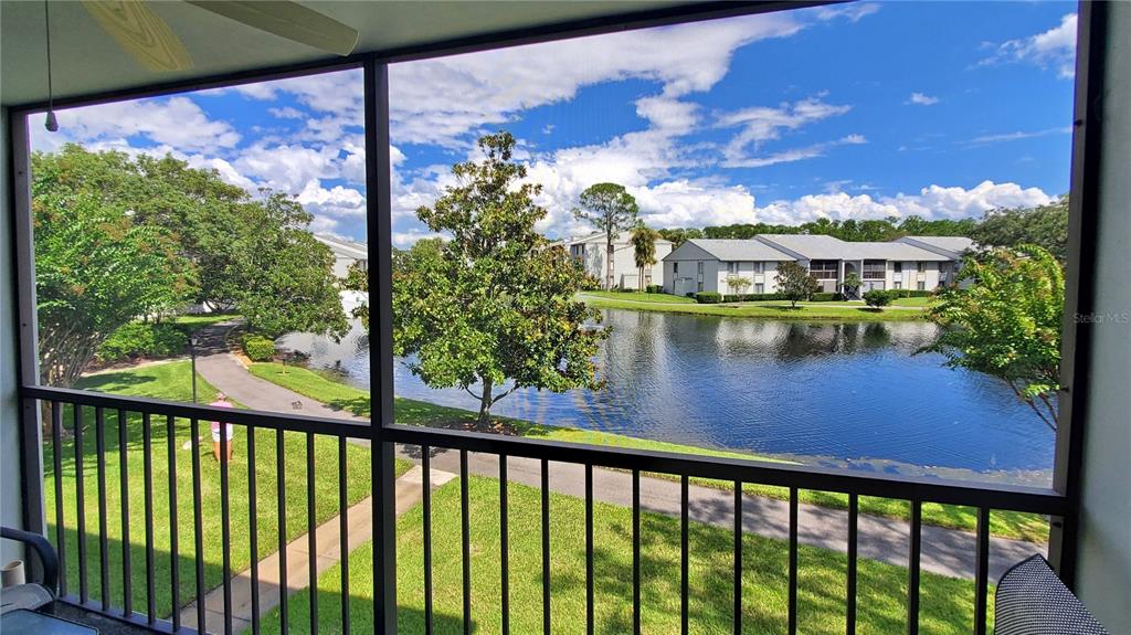 928 South Pine Ridge Circle Sanford, FL 32773 - Photo 15 of 22 a view of a lake from a balcony