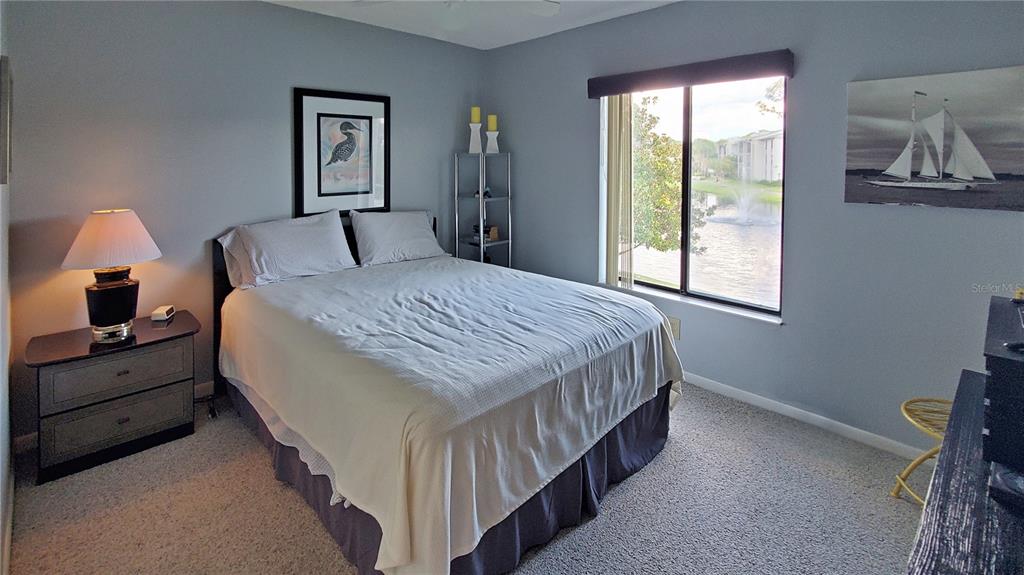 928 South Pine Ridge Circle Sanford, FL 32773 - Photo 16 of 22 a bed room with a bed and a window