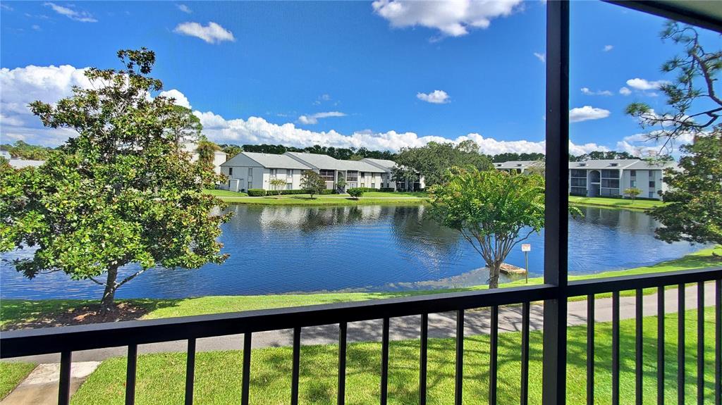 928 South Pine Ridge Circle Sanford, FL 32773 - Photo 18 of 22 a view of a balcony with lake view