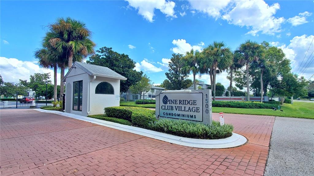 928 South Pine Ridge Circle Sanford, FL 32773 - Photo 22 of 22 a sign board with a garden and plants