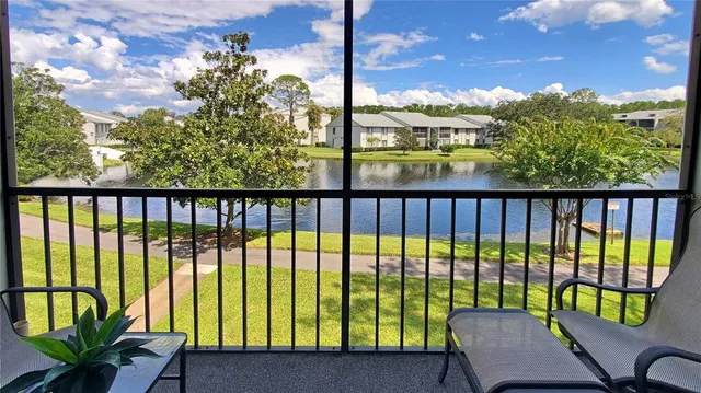 a kitchen with stainless steel appliances a sink stove and cabinets