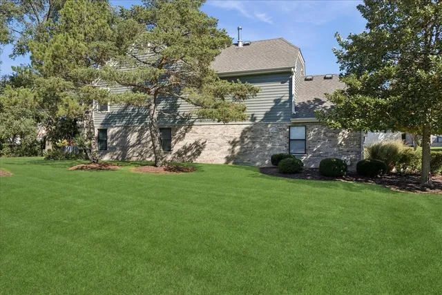 a view of a house with a garden