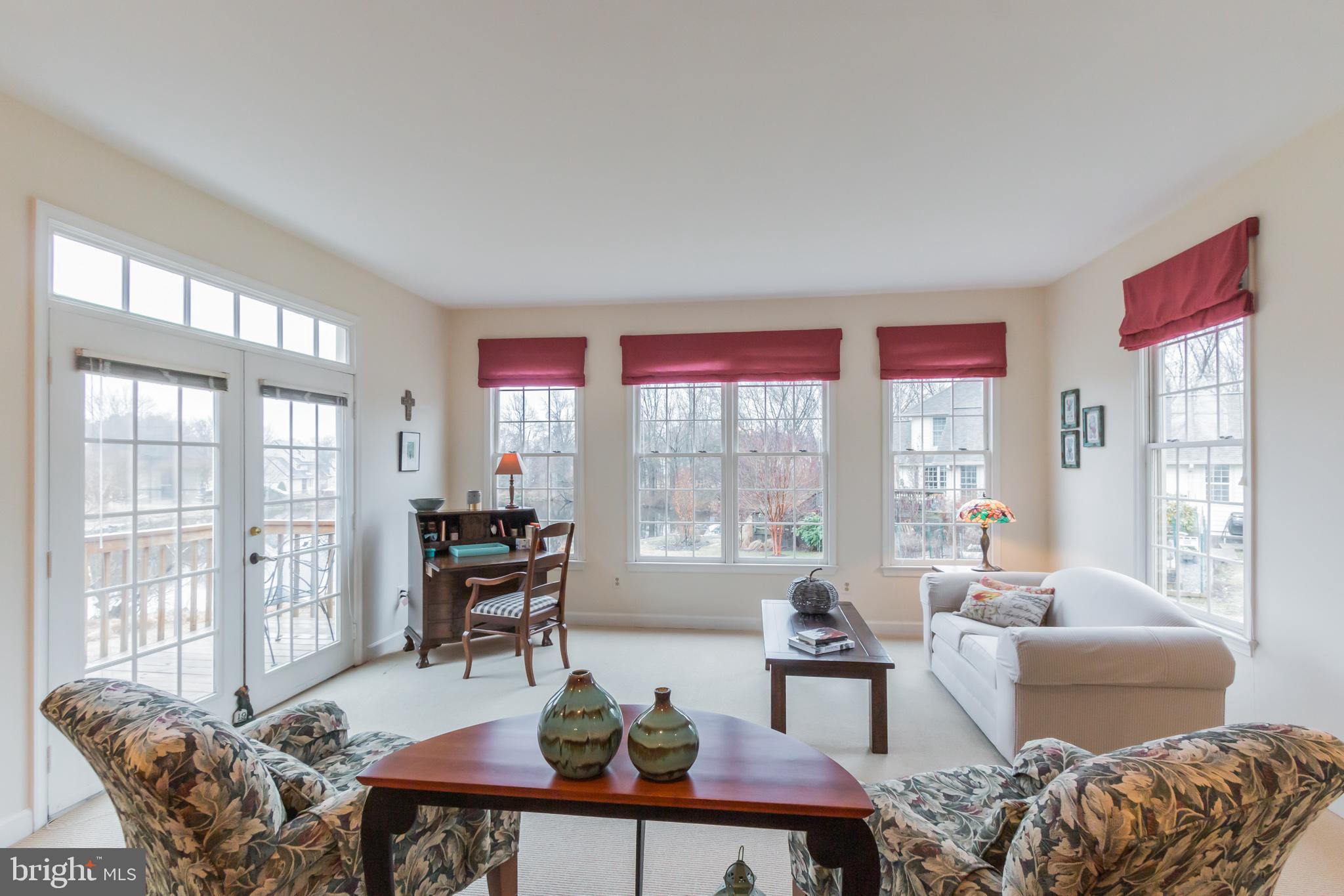 1910 Merrifields Drive Silver Spring, MD 20906 - Photo 13 of 47 Sunken living room leads to deck-great views!