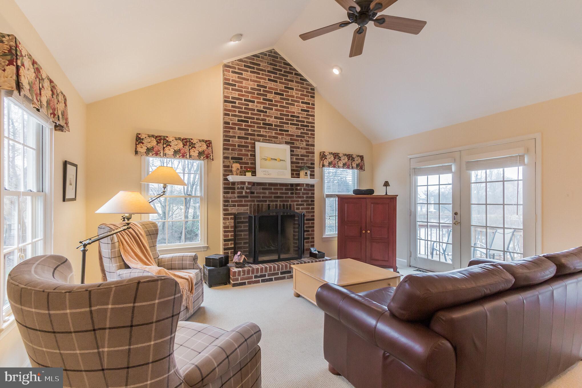 1910 Merrifields Drive Silver Spring, MD 20906 - Photo 16 of 47 Family room leads to deck with pond views