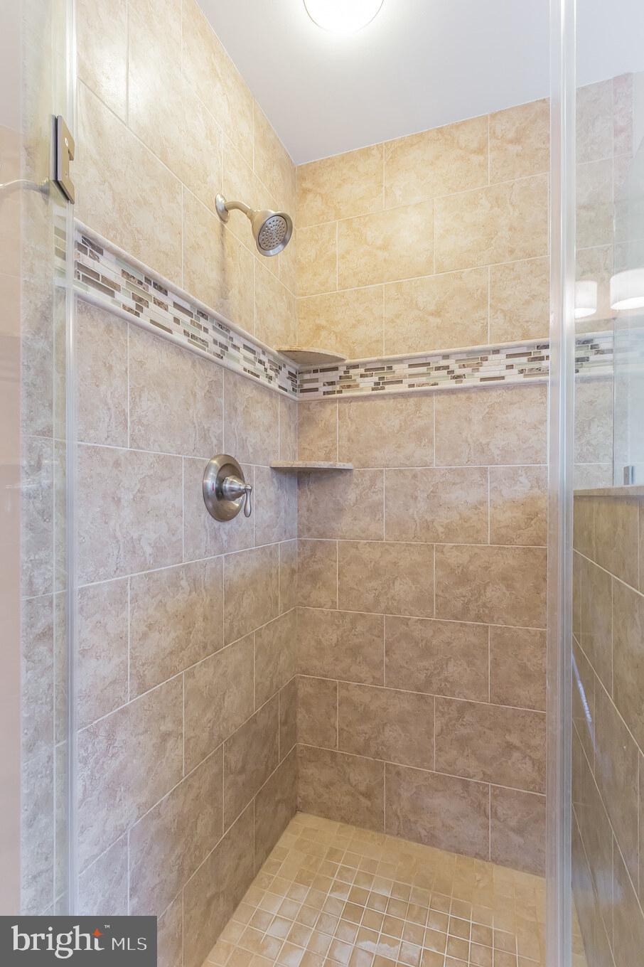 1910 Merrifields Drive Silver Spring, MD 20906 - Photo 23 of 47 Separate glass enclosed shower - owner's bath