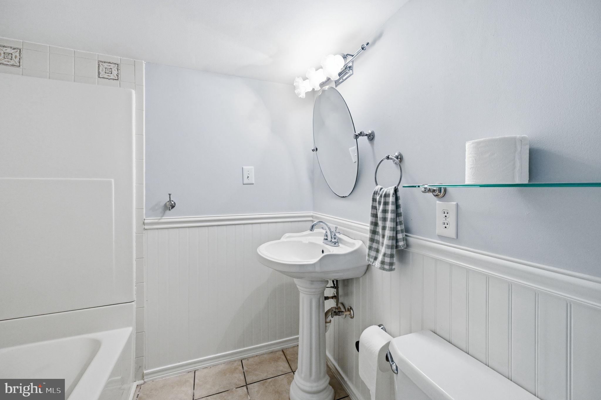 9337 Everona Road Unionville, VA 22567 - Photo 36 of 46 Charming full bathroom with classic elegance.