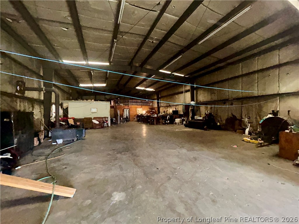 918 Opal Road Red Springs, NC 28377 - Photo 19 of 26 a view of parking garage with cars
